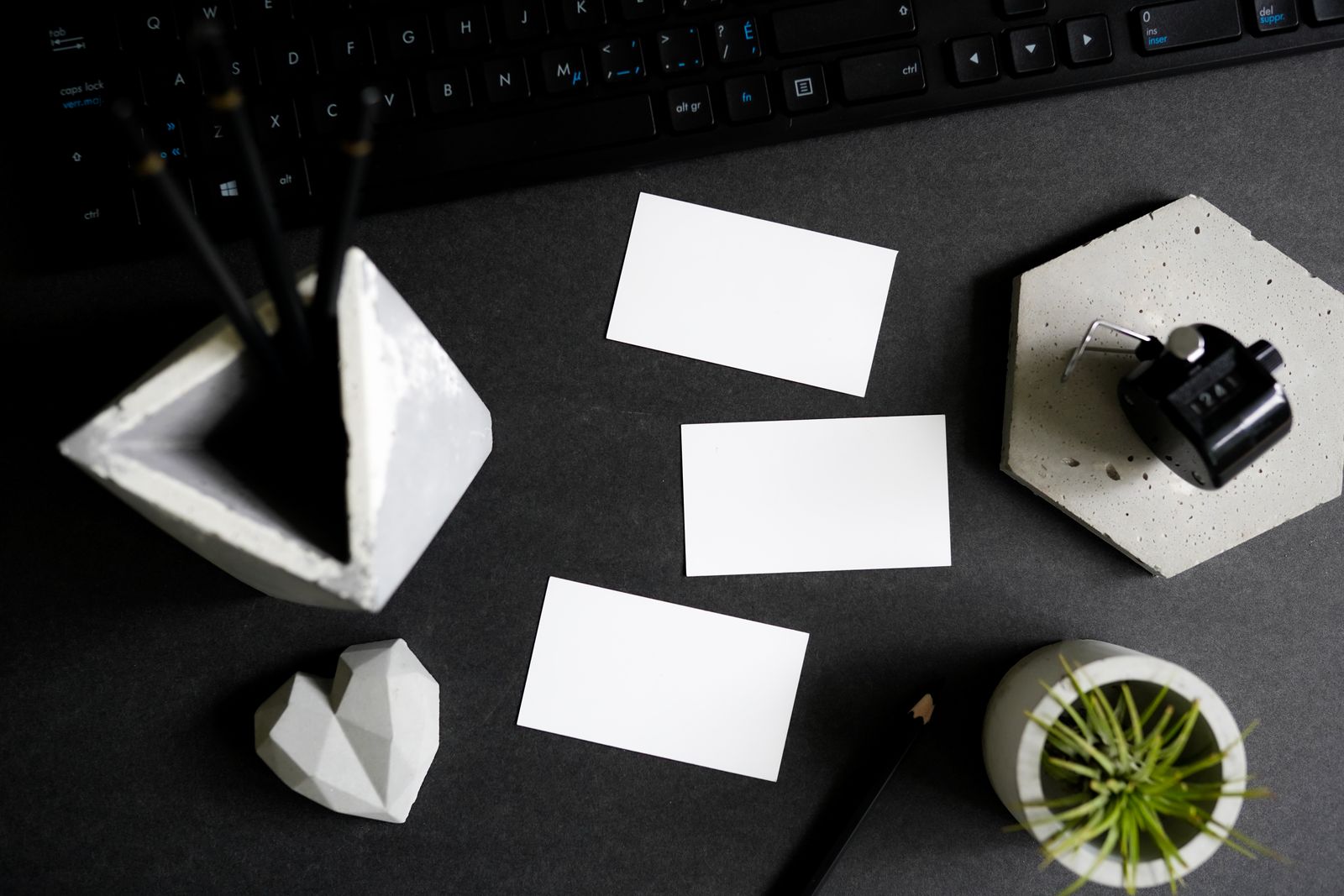 Business stationery and cards on a neatly arranged desk
