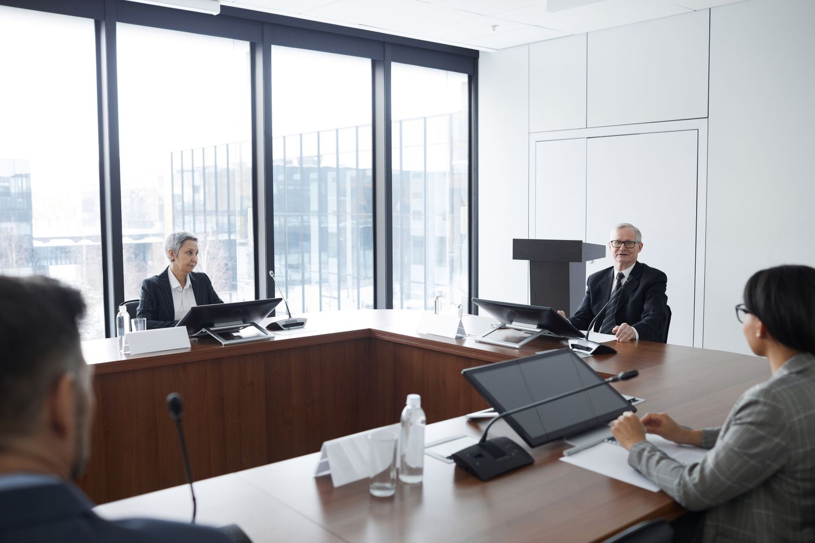 Company leadership meeting in a conference room